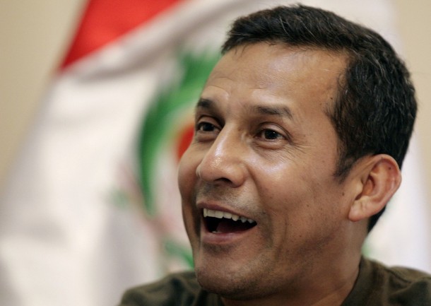 Peru's opposition leader and ex-army officer Humala smiles during interview with Reuters in Lima