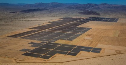 Solar panels are seen in this aerial photograph of First Solar Inc.'s Desert Sunlight Solar Farm in Mojave Desert, California, U.S., on Friday, April 5, 2013. First Solar Inc., the largest thin-film panel manufacturer, sees ?significant growth? in renewable energy projects being developed in the Middle East and North Africa by the end of 2014. Photographer: Tim Rue/Bloomberg